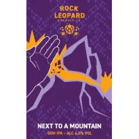 Rock Leopard Next to a Mountain